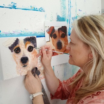 Sunday L Artist painting a pet portrait of a jack russell terrier